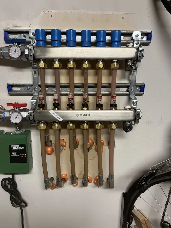 Plumber performing Water Heater Repair at a residential property in Moosic